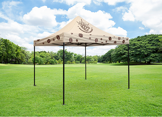 A tent featuring a coffee cup design, showcasing a unique and playful outdoor camping aesthetic.