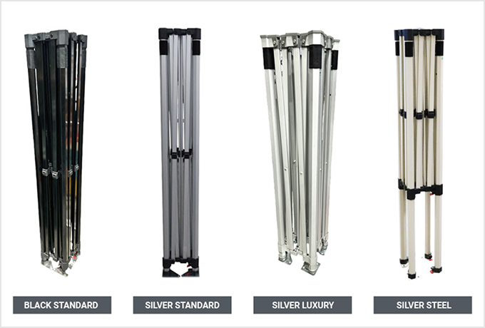 Four metal poles of varying sizes and designs, showcasing different heights and thicknesses against a neutral background.