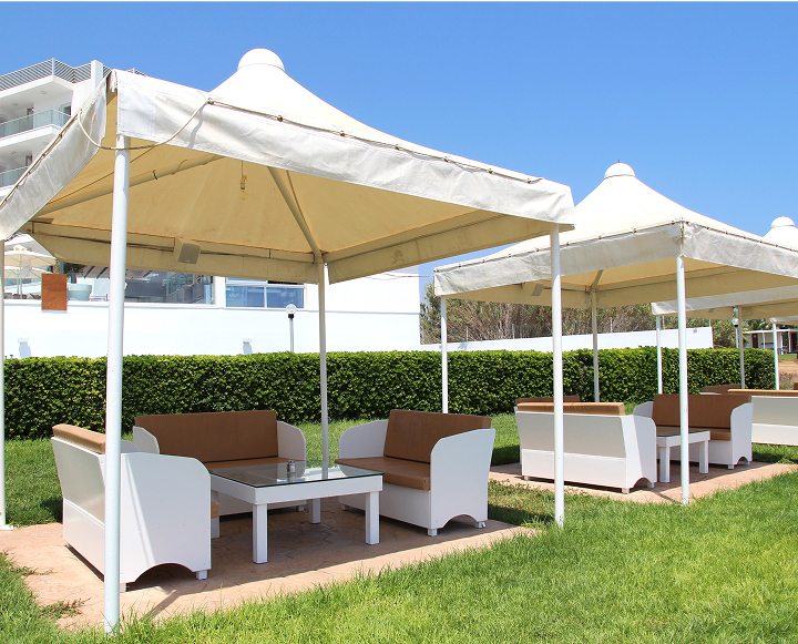 Lush green lawn with vibrant grass, showcasing a healthy and well-maintained outdoor space.
